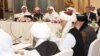 FILE - Undated handout picture of US, Taliban, and Qatar officials during a meeting for peace talks in Doha, Qatar. (Qatari Foreign Ministry) 