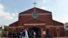 Pakistani Christians gather in front of a church following suicide bombing attacks on churches in Lahore, March 15, 2015. 